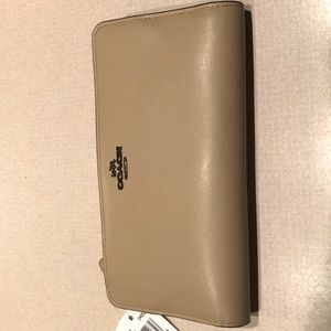 Coach tan wallet new with tags never used